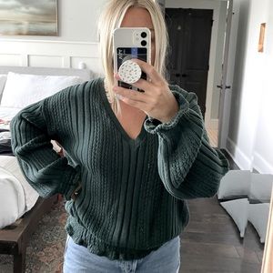 Dark green sweater